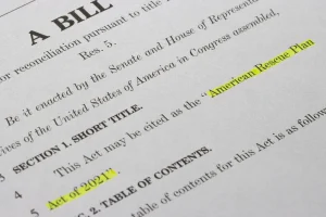 A close up of a proposition bill with some words and phrases highlighted.