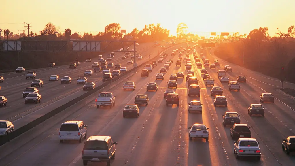 A shot of a freeway with the sun setting.