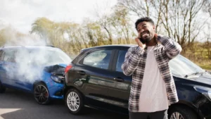 A rear end accident and a man who is nervous and on the phone.