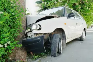 A car crashed into a tree.