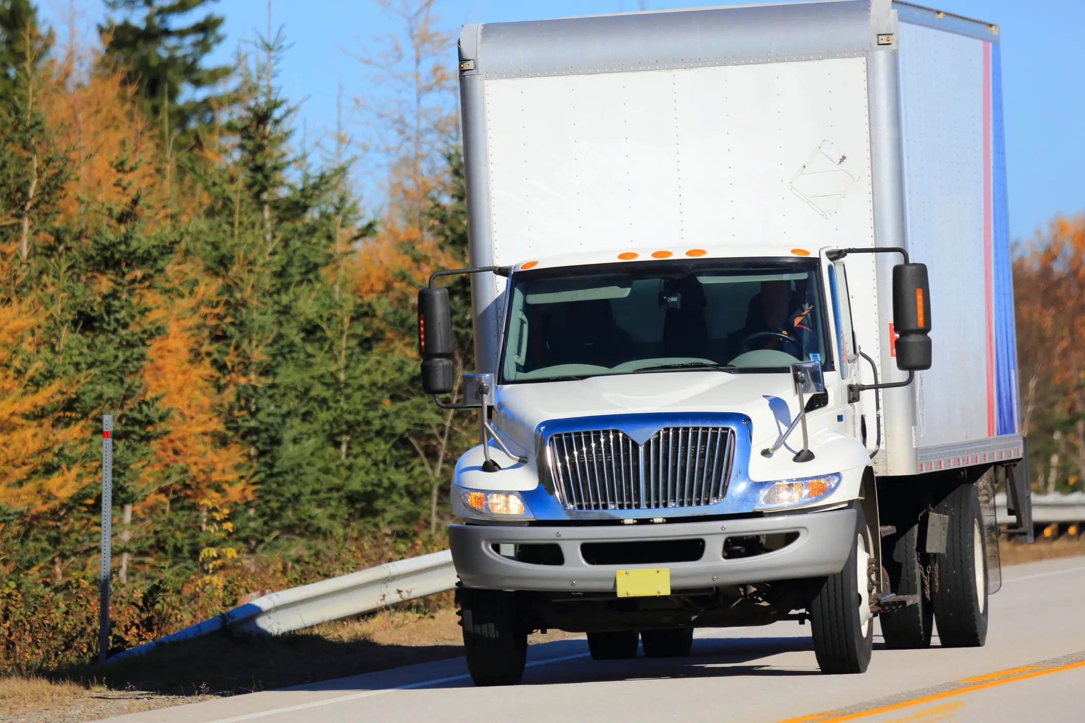 A truck driving on the road.