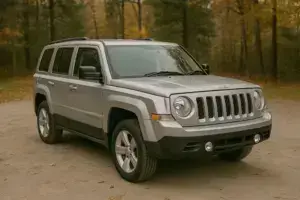 A gray Jeep Patriot that is a lemon.
