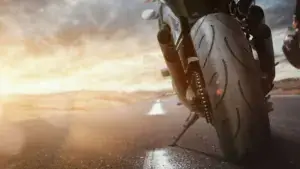 A motorcycle lane splitting on a Nevada road.